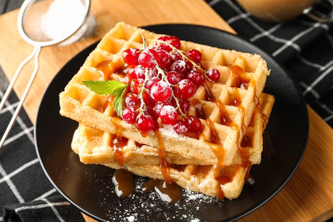 Beautiful composition with sweet waffles, closeup