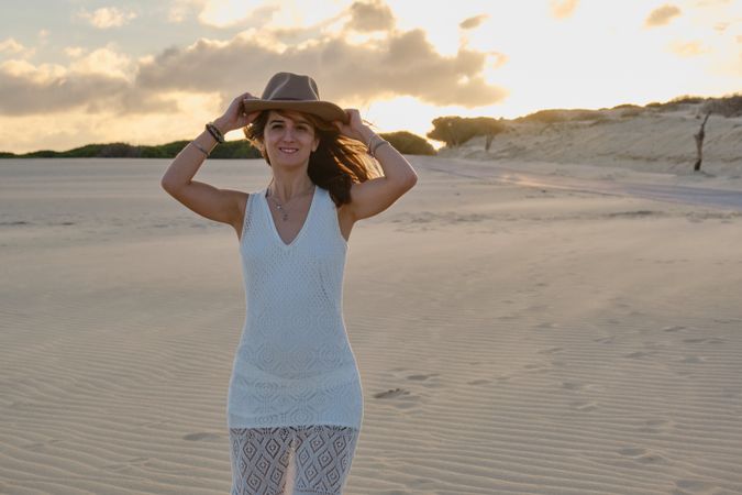 woman on desert nature during sunset