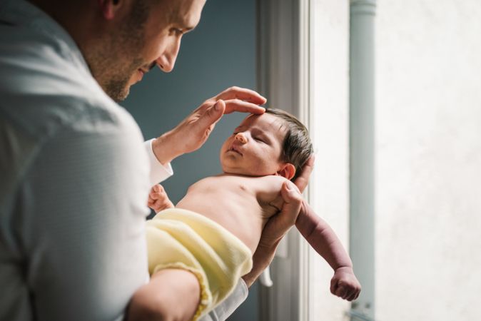 Father holding baby