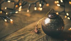 Christmas tree decorations, on wooden counter, close up, copy space