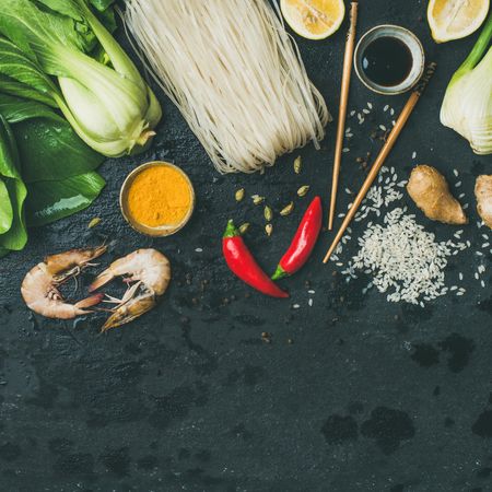 Asian cuisine ingredients over slate stone background