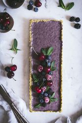 Fresh blueberry pistachio cake with whole berries on top