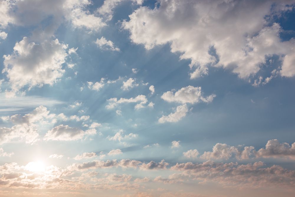 Blue sky full of light clouds