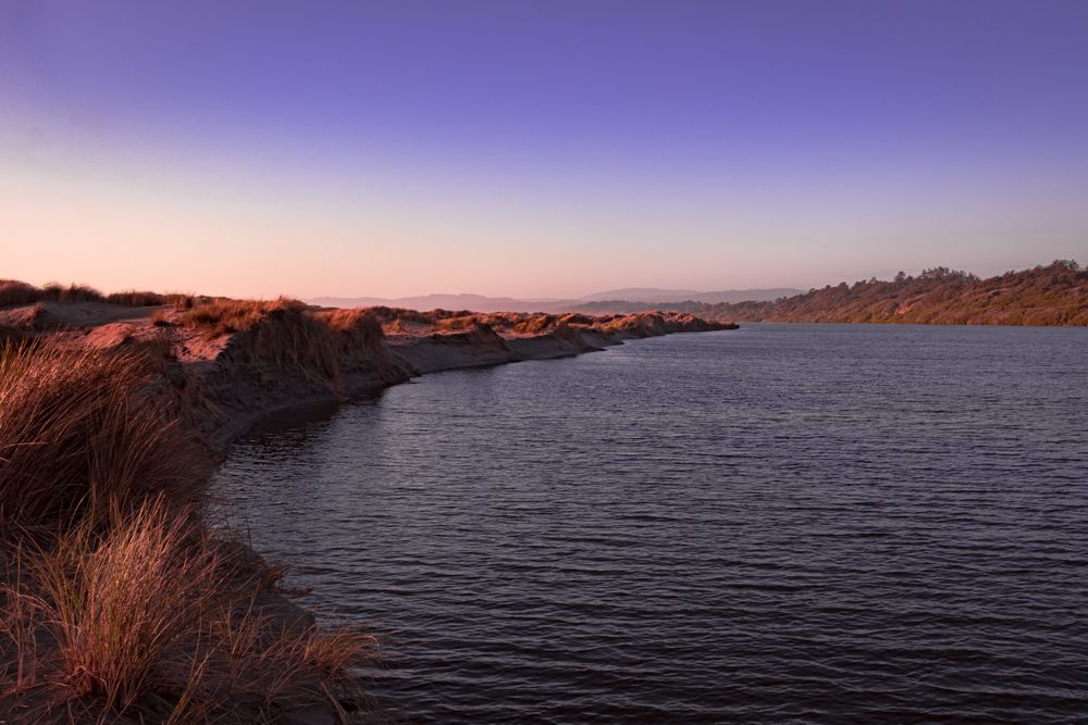 Lake with hills in the background