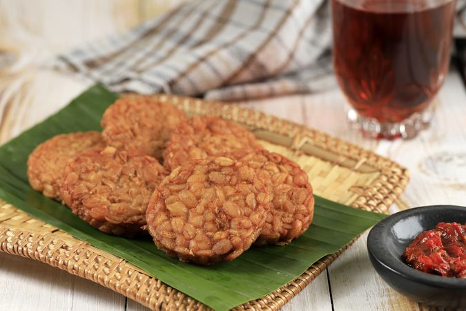 Fried Tempeh.  Indonesia Traditional Food Made from Fermented Soybean Seeds