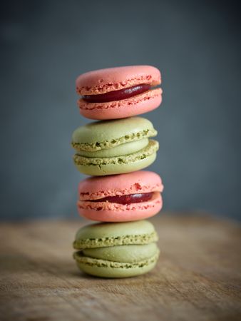 Sweet macaroons on wooden table