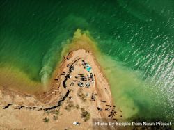 Aerial view of people on brown sand beach 41YD74