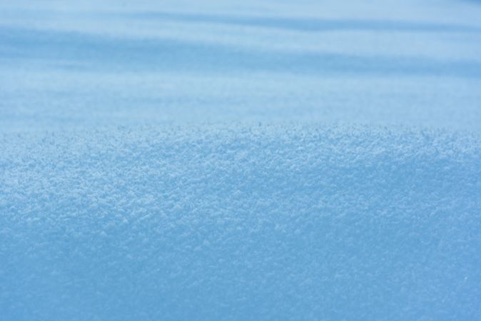 Winter background, full-frame with deep snow in the Bavarian Alps, Germany