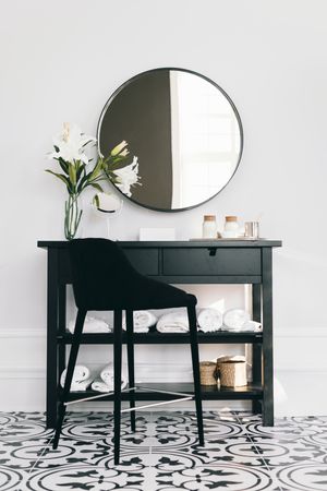 Bathroom drawer with mirror and flowers