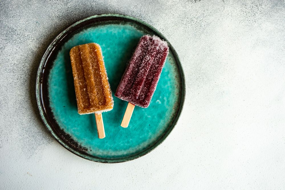 Two fruity ice cream pops