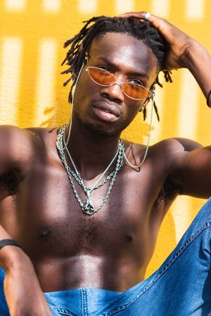 Stylish shirtless Black man