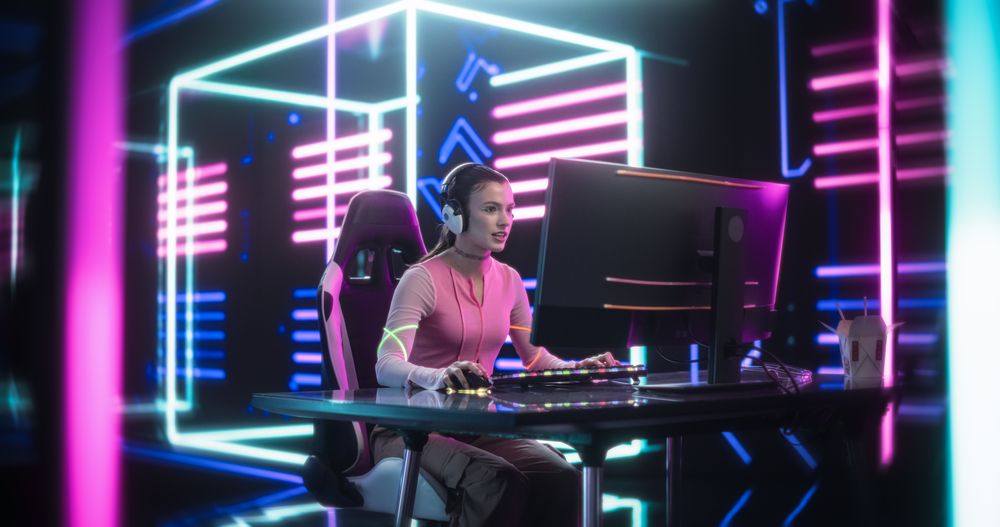 Portrait of an Excited Woman in Headphones Battling in PvP Tournament with Other Players, Talking with Team on Microphone
