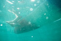 Underwater with person on boat