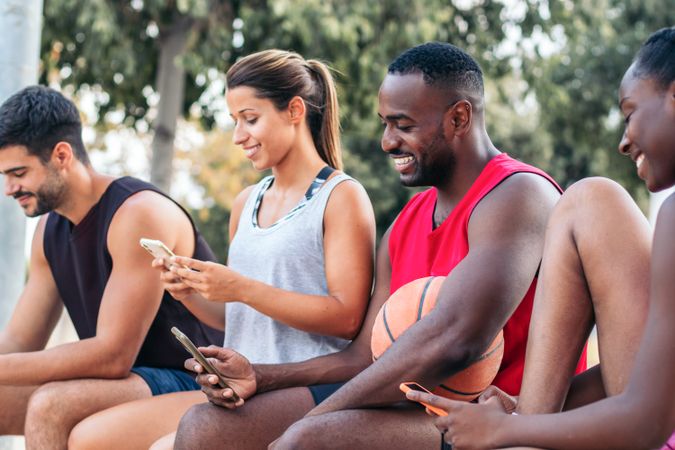 Using the smartphone on the court after a basketball game