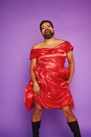 Gay man wearing makeup and female dress