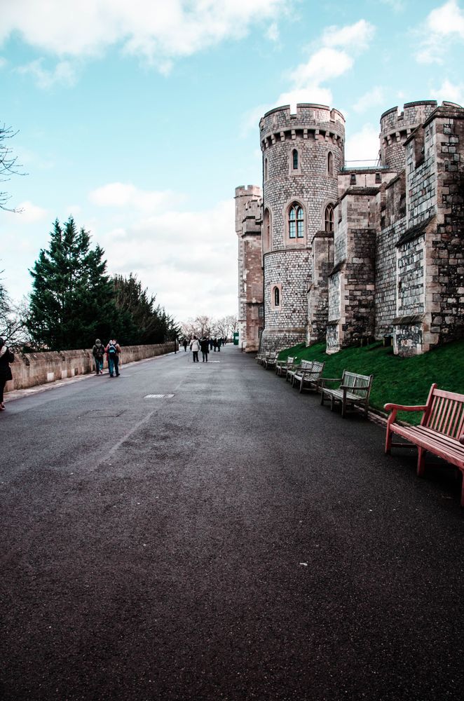 People walking in front of Windsor castle in UK