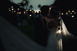 Marriage of woman and man embracing in darkness