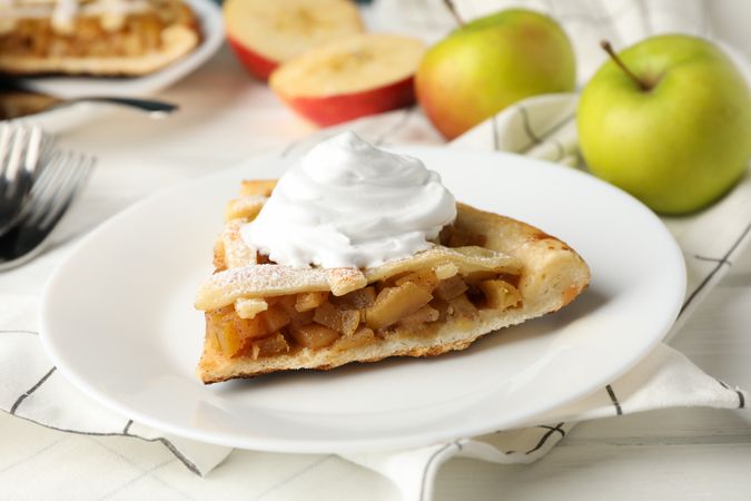 Composition with apple pie on wooden background. Tasty lunch. Homemade breakfast