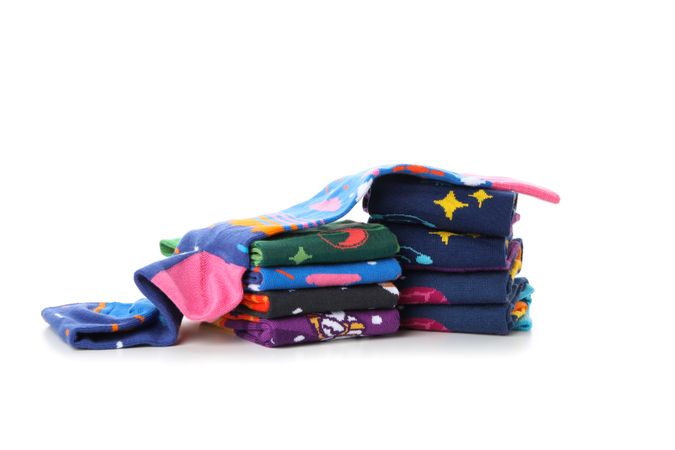 Group of socks isolated on light background