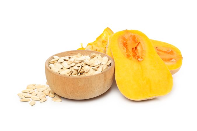 Concept of Autumn vibe food, Pumpkin, Pumpkin seeds, isolated on light background