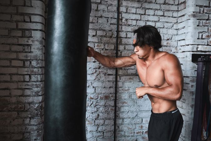 man boxing in gym