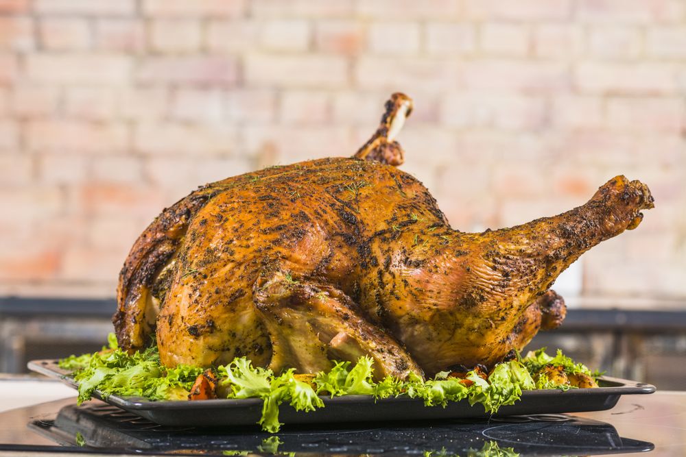 Baked chicken with lettuce on pan