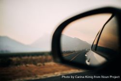 View of the mountains in the rearview mirror v4mjWb