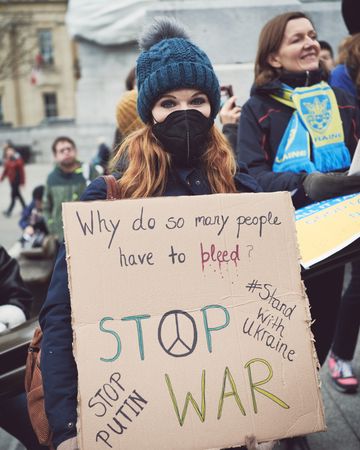 London, England, United Kingdom - March 5 2022: Woman with “stop war” sign in London