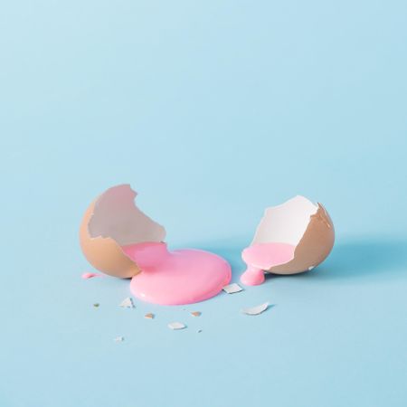 Open eggshell with pastel pink paint