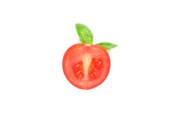 Fresh cherry tomato with basil isolated on blank background. Ripe vegetables