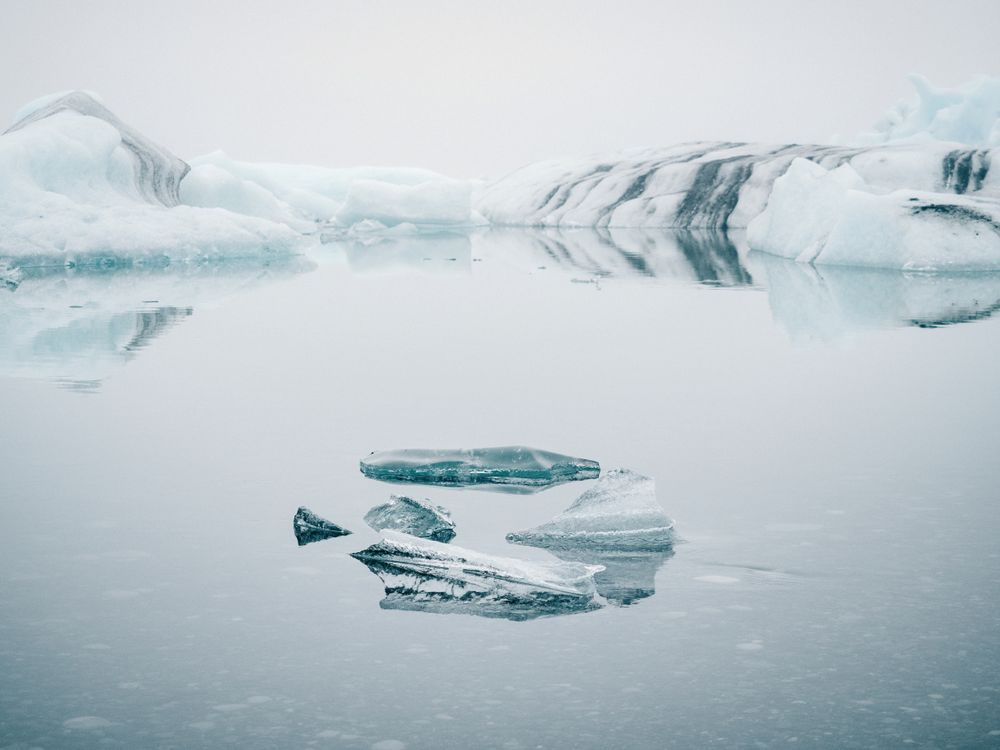 Ice on water between snow