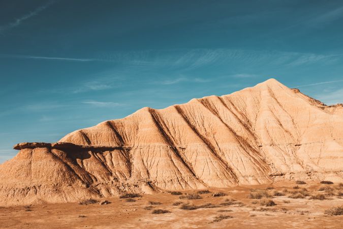 Desert cliffs under blue sky in landscape