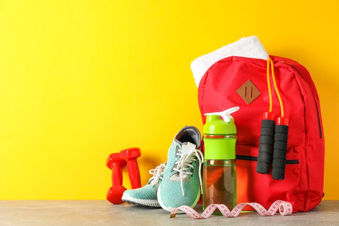 Loss weight accessories on grey table against color background