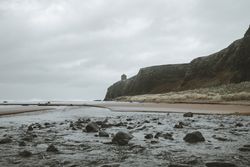 Old temple located on cliff in Northern Ireland coast