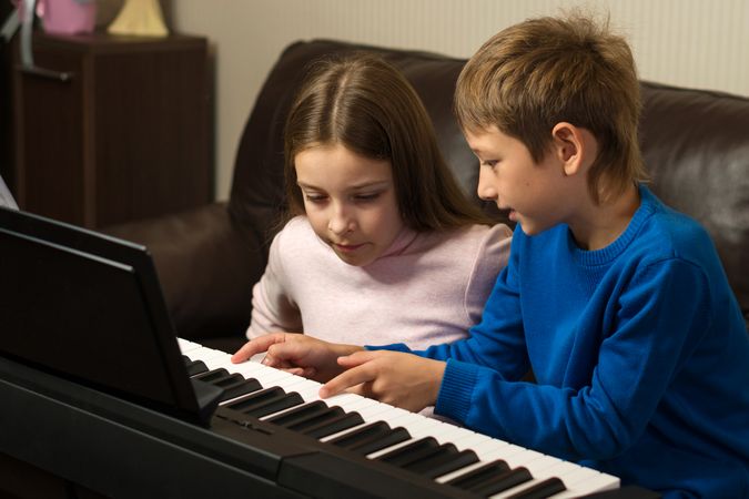 Harmonious Sibling Piano Lesson