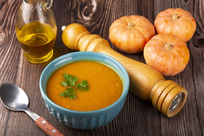 Delicious homemade pumpkin soup in bowl.
