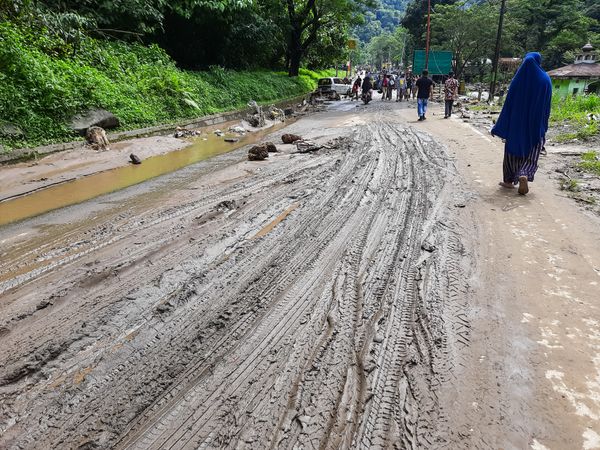 Tanah Datar, Indonesia - May 12, 2024: road conditions mixed with mud. Natural Disaster in Lembah Anai, Sepuluh Koto, Tanah Datar Regency, West Sumatra, Indonesia