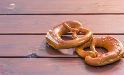 German pretzel in sunlight on table