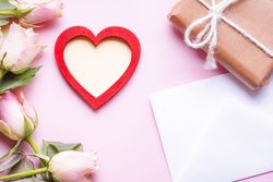 Red wooden heart and roses