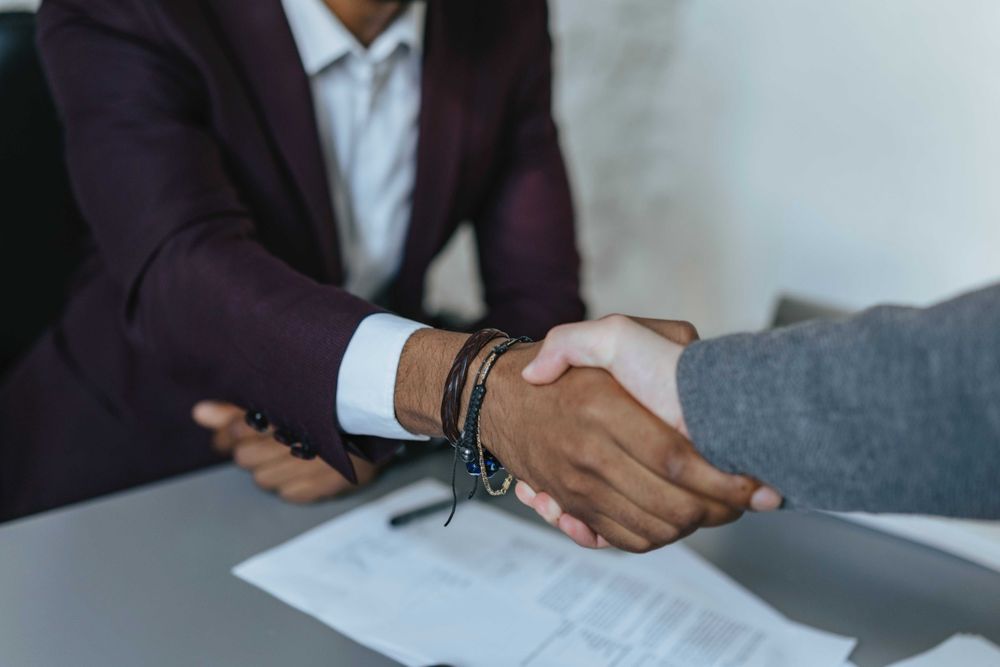 Businessman handshaking a person