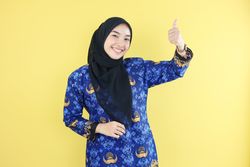 Female Goverment Worker Making OK Thumbs Up Gesture