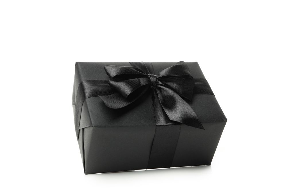 dark gift box isolated on light background