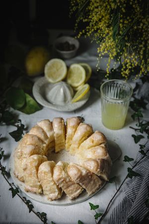 Bundt cake cut into pieces on table