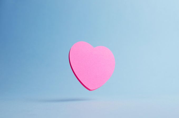 Pink heart shaped sticky note
