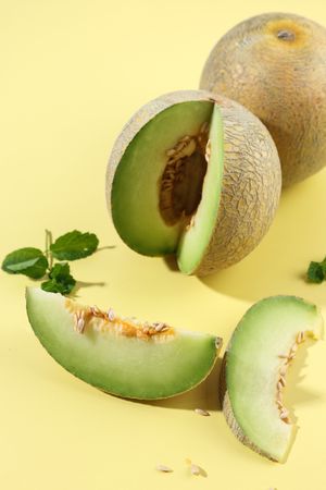 Cantaloupe Green Melon on Yellow Table