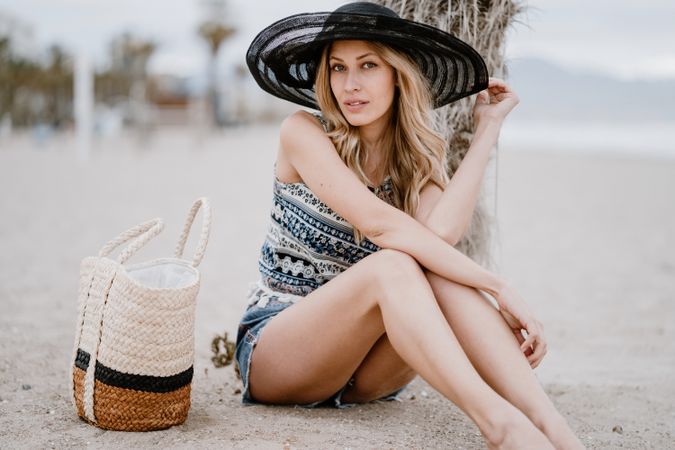 Young female relaxing on beach