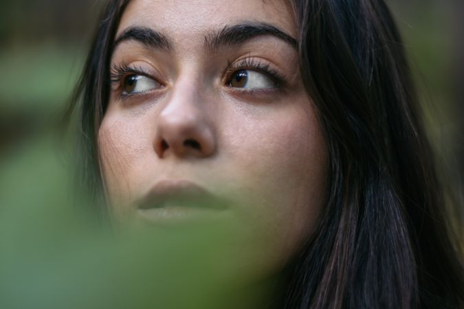 Portrait of a young woman in the forest