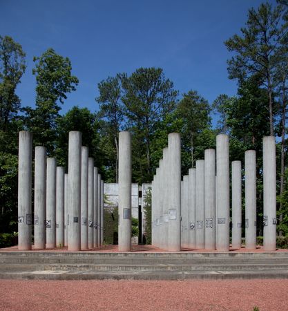 Stark concrete column grave markers at Alabama Veterans Memorial Park