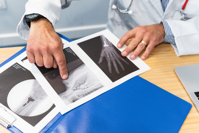 Crop doctor with x rays in medical office