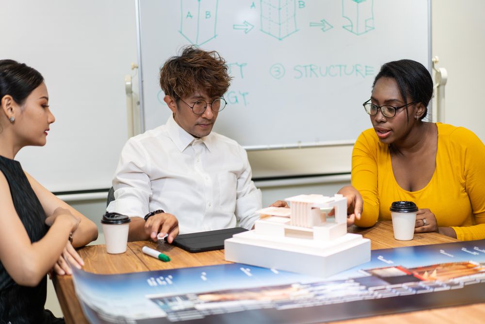 Group of architects discussing building project